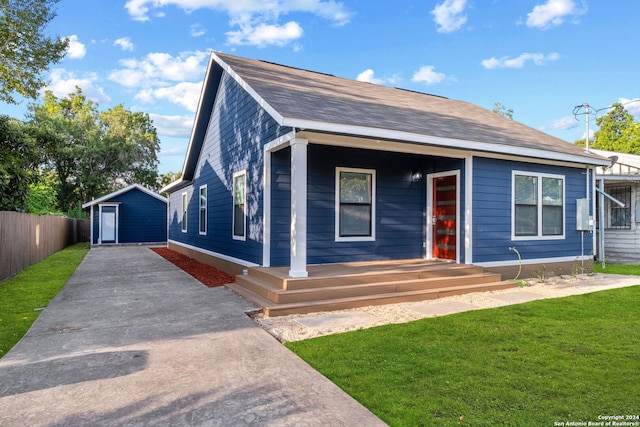 view of front of house with a front lawn and a porch