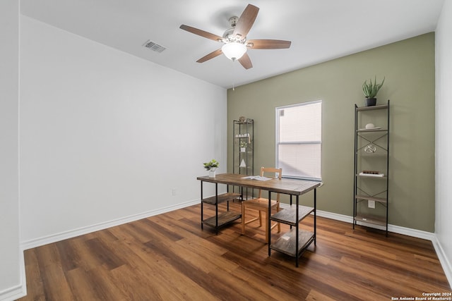 office space with dark wood-type flooring and ceiling fan