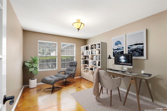 office featuring wood finished floors and baseboards