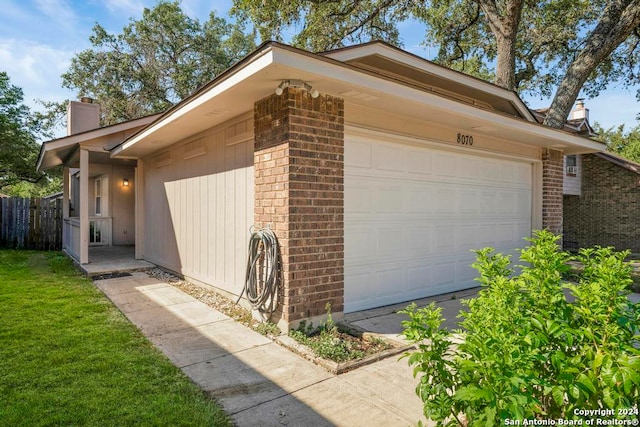 view of side of property with a yard