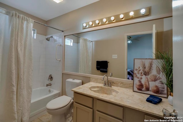 full bathroom featuring tile patterned flooring, toilet, shower / tub combo, ceiling fan, and vanity