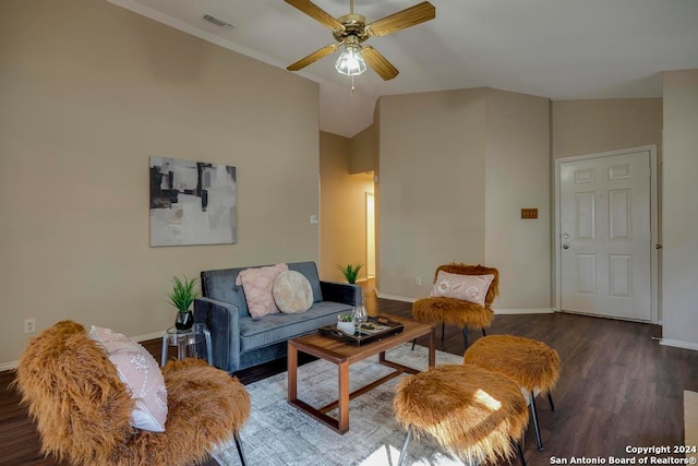 living room featuring dark wood-type flooring, lofted ceiling, and ceiling fan