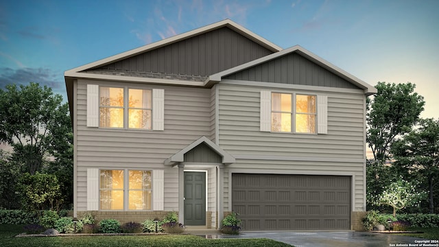 view of front of home with a garage