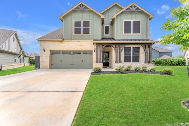 craftsman-style house with a garage and a front yard