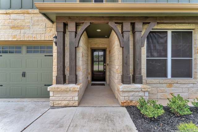 property entrance with a garage