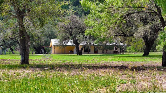 201 N Tomahawk Way, Concan, TX 78801 - view of green lawn