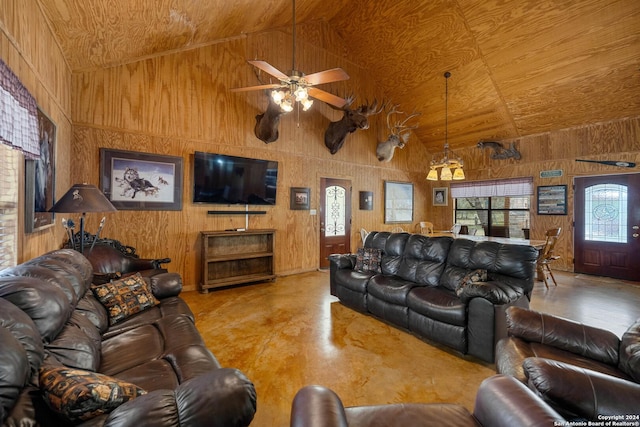 living room with ceiling fan, wood walls, wood ceiling, and high vaulted ceiling