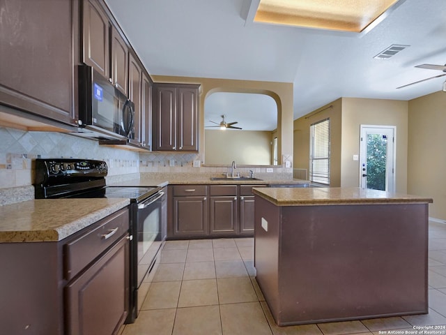 kitchen featuring a sink, visible vents, black appliances, and a ceiling fan