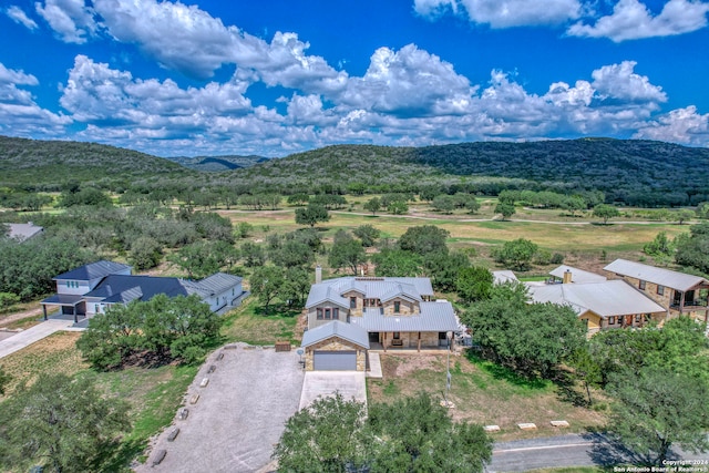 drone / aerial view featuring a mountain view