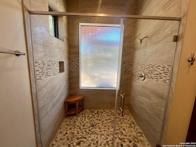 bathroom with an enclosed shower