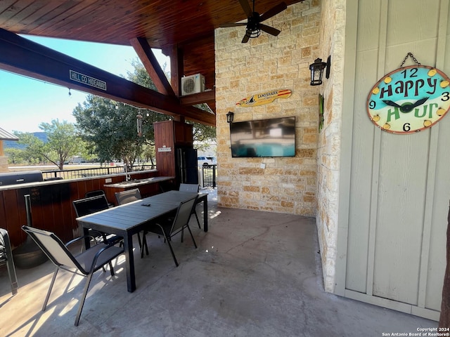 view of patio / terrace featuring ceiling fan