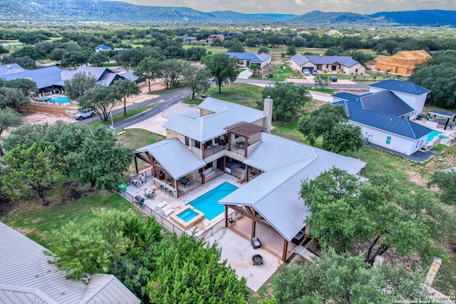 drone / aerial view featuring a mountain view