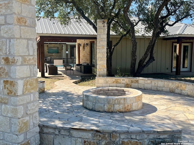 property entrance featuring a patio area