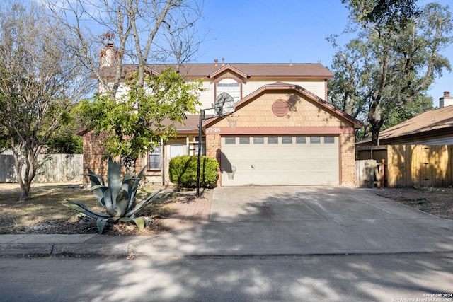 view of front of property with a garage