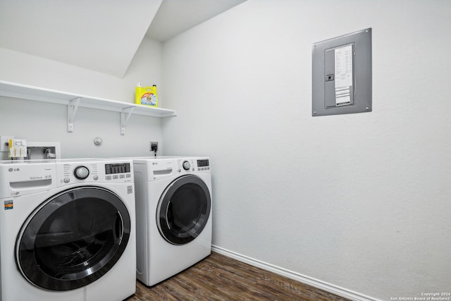 laundry area with dark wood finished floors, laundry area, baseboards, and washing machine and clothes dryer