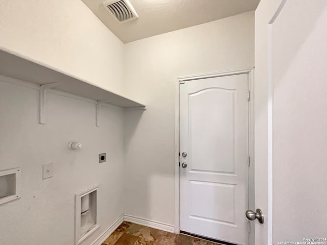 washroom with washer hookup, electric dryer hookup, and hookup for a gas dryer