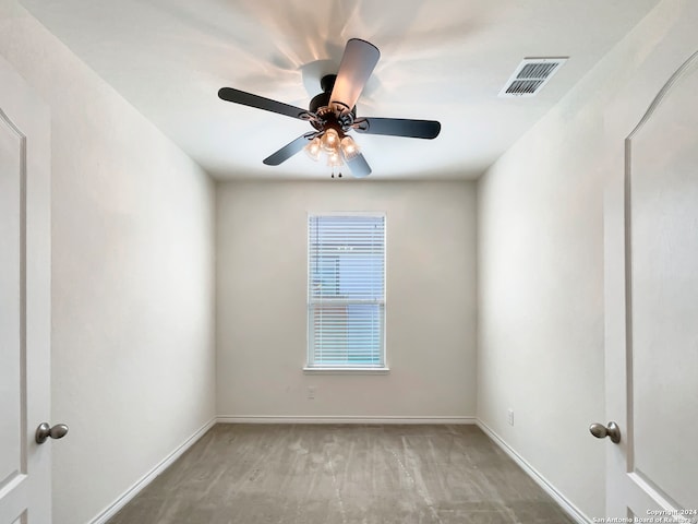 unfurnished room with ceiling fan and hardwood / wood-style floors