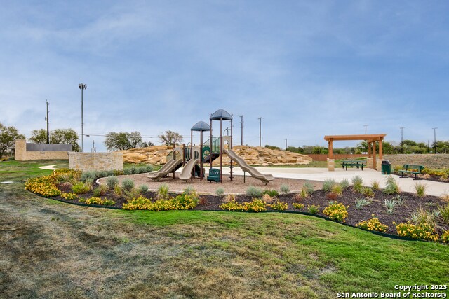 view of jungle gym with a yard