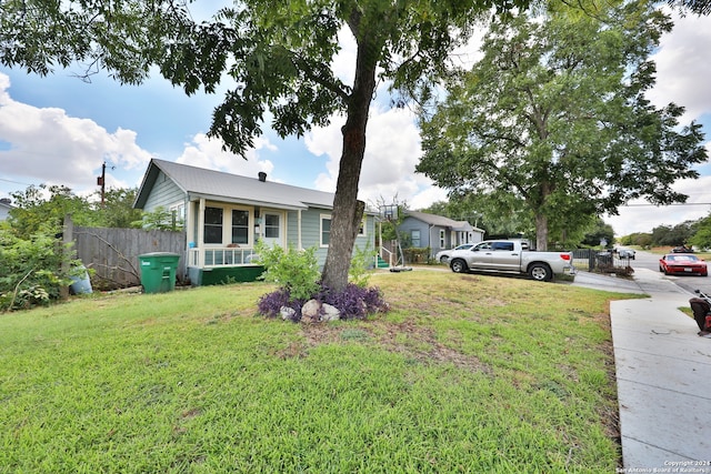 view of front of home with a front yard