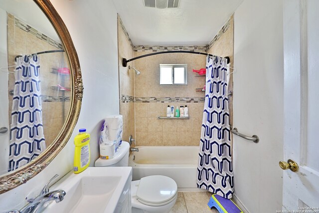 full bathroom with vanity, toilet, shower / tub combo, and tile patterned floors