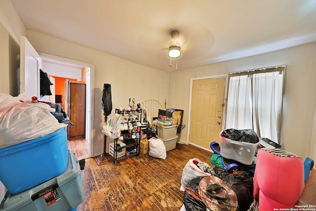 interior space featuring a ceiling fan and wood finished floors