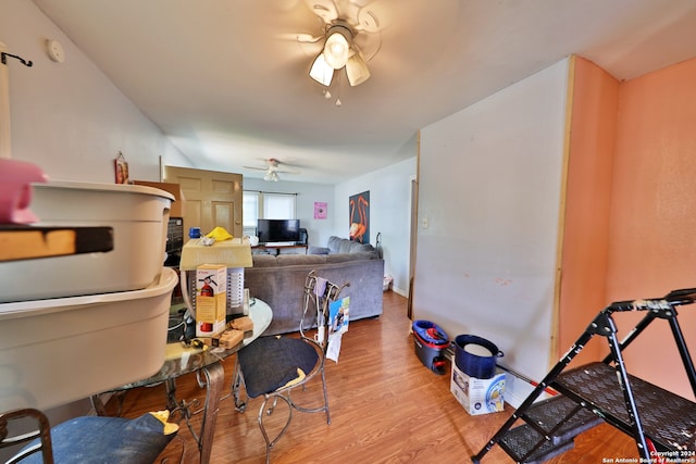kitchen with wood finished floors and ceiling fan