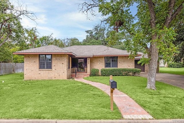 ranch-style house with a front yard