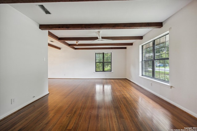 unfurnished room featuring wood-type flooring, beam ceiling, and ceiling fan