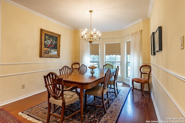 dining space with ornamental molding, dark hardwood / wood-style floors, and a chandelier