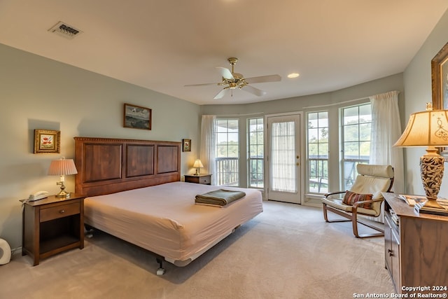 carpeted bedroom with access to outside and ceiling fan