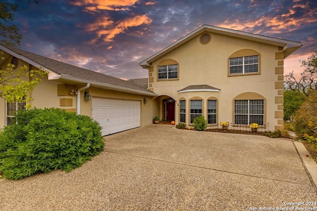 view of front of home with a garage