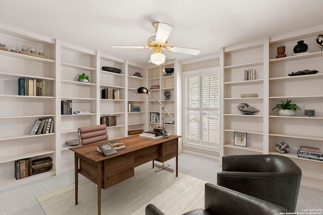 home office with ceiling fan, light carpet, and ornamental molding