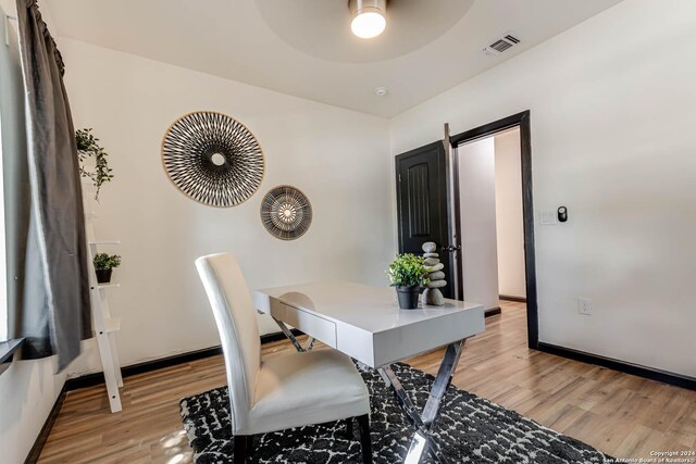 office area with light wood-type flooring