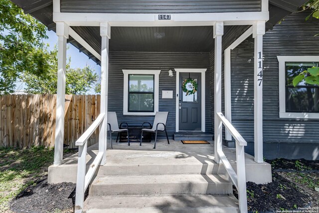 property entrance with a porch