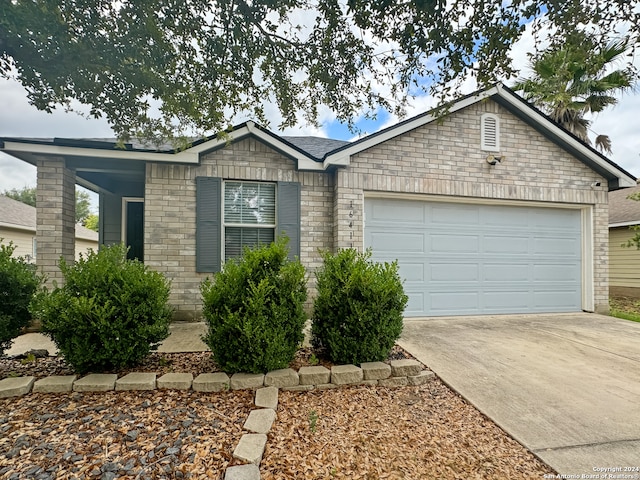 single story home with a garage