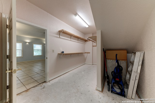 interior space with a textured ceiling