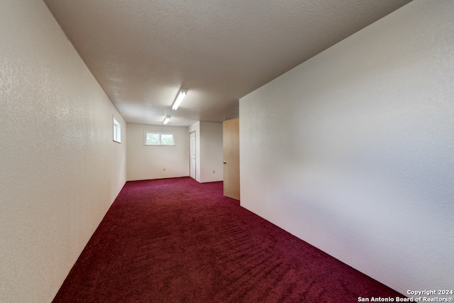 interior space featuring a textured ceiling