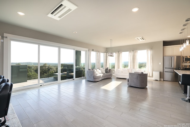 living room featuring light wood-type flooring