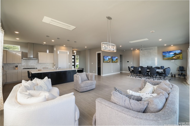 living room with light hardwood / wood-style flooring