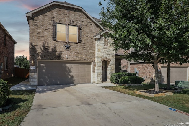 view of front of home with a garage