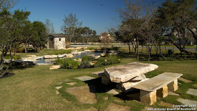 surrounding community featuring a yard and a storage shed