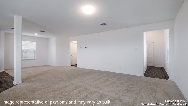 empty room featuring carpet floors