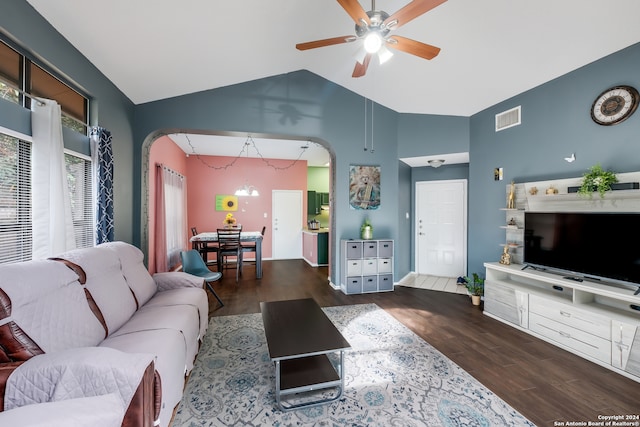 living room with ceiling fan, dark hardwood / wood-style floors, and high vaulted ceiling