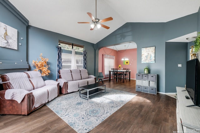 living room featuring high vaulted ceiling, ceiling fan, and dark hardwood / wood-style floors