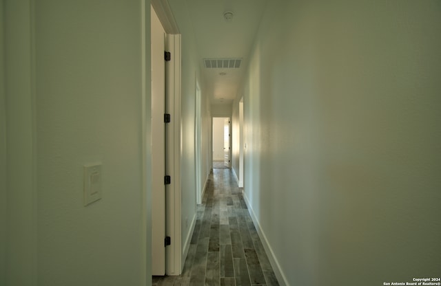 hall featuring wood-type flooring