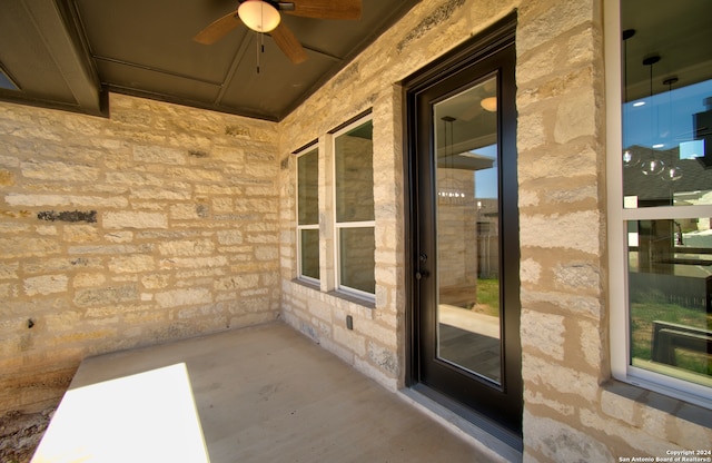 view of patio with ceiling fan