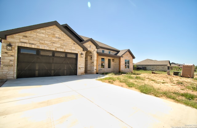 view of front of home featuring a garage