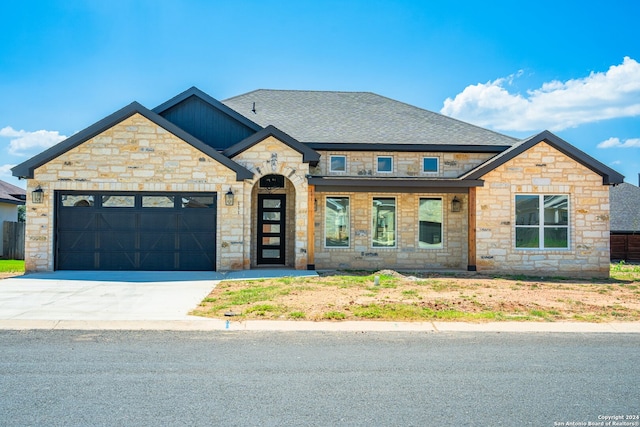 craftsman-style house featuring a garage