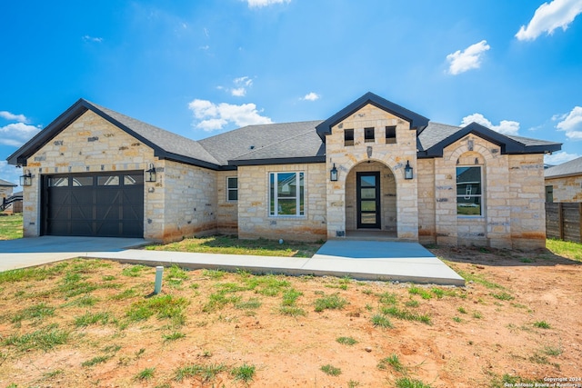 view of front of house with a garage