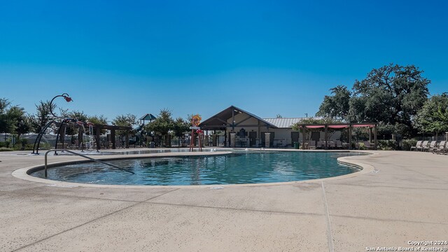 view of pool with a patio